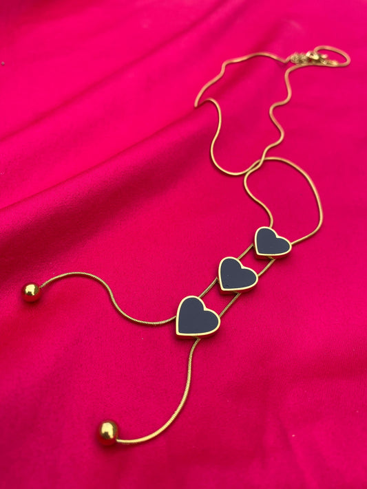 Necklace with heart-shaped pendants