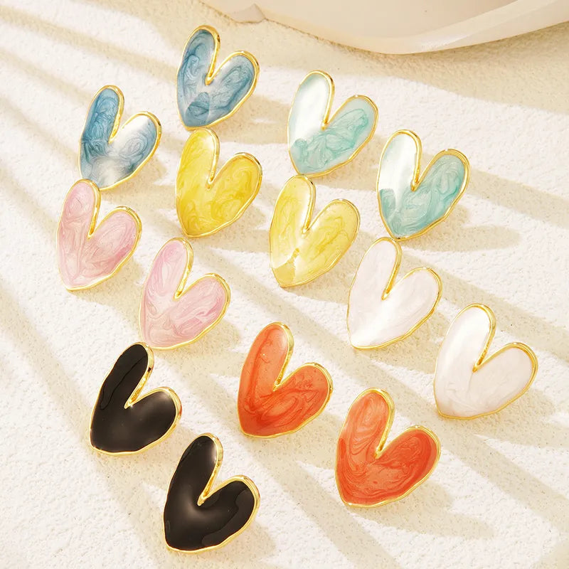 Enamel heart stud earrings in multiple colors — black, blue, pink, yellow, white, coral