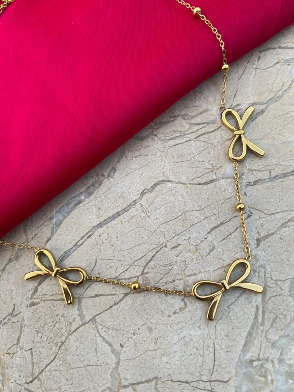 Gold necklace with bow-shaped pendants (stainless steel)