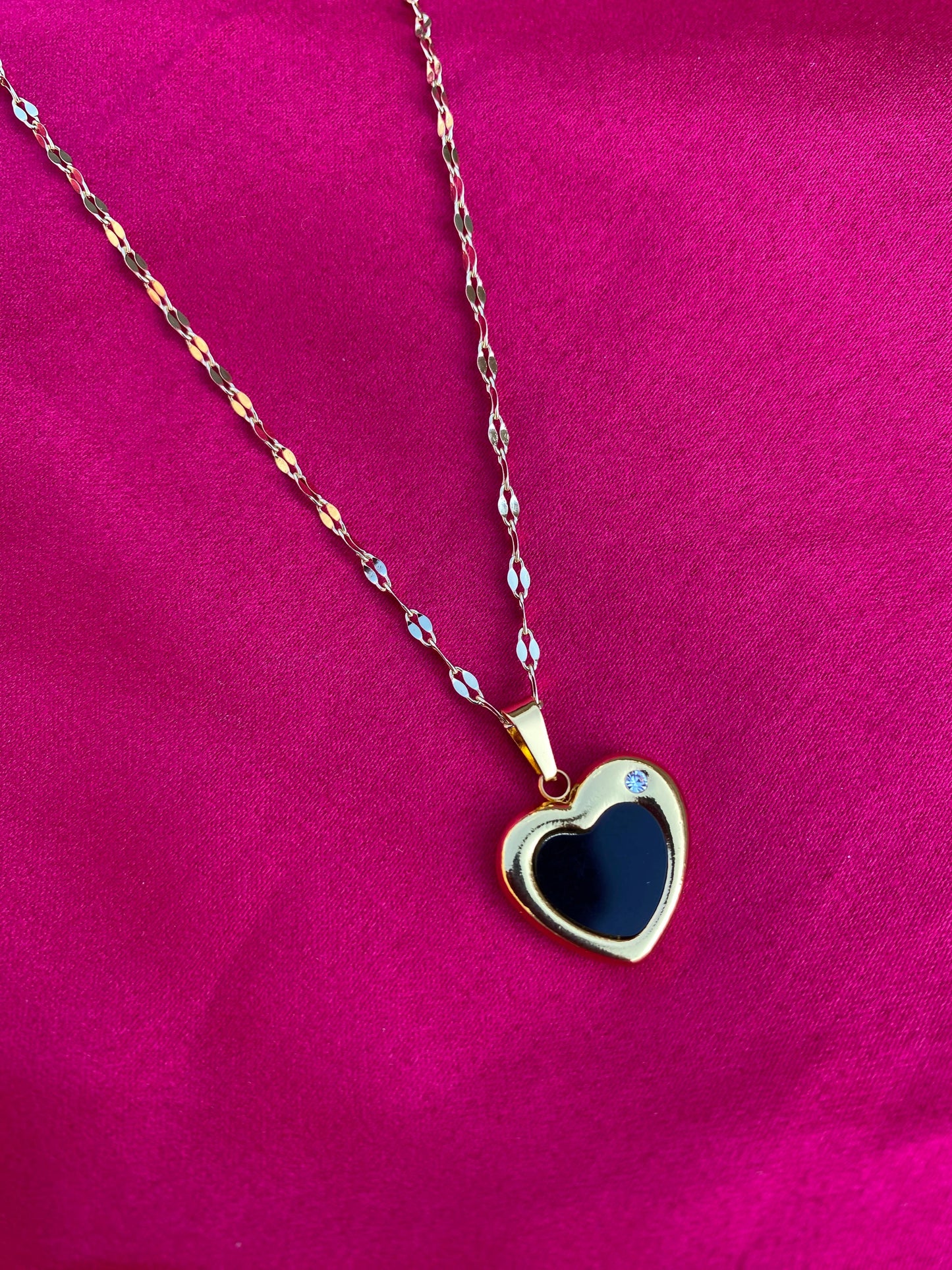 Necklace with a heart-shaped black pendant  (stainless steel)