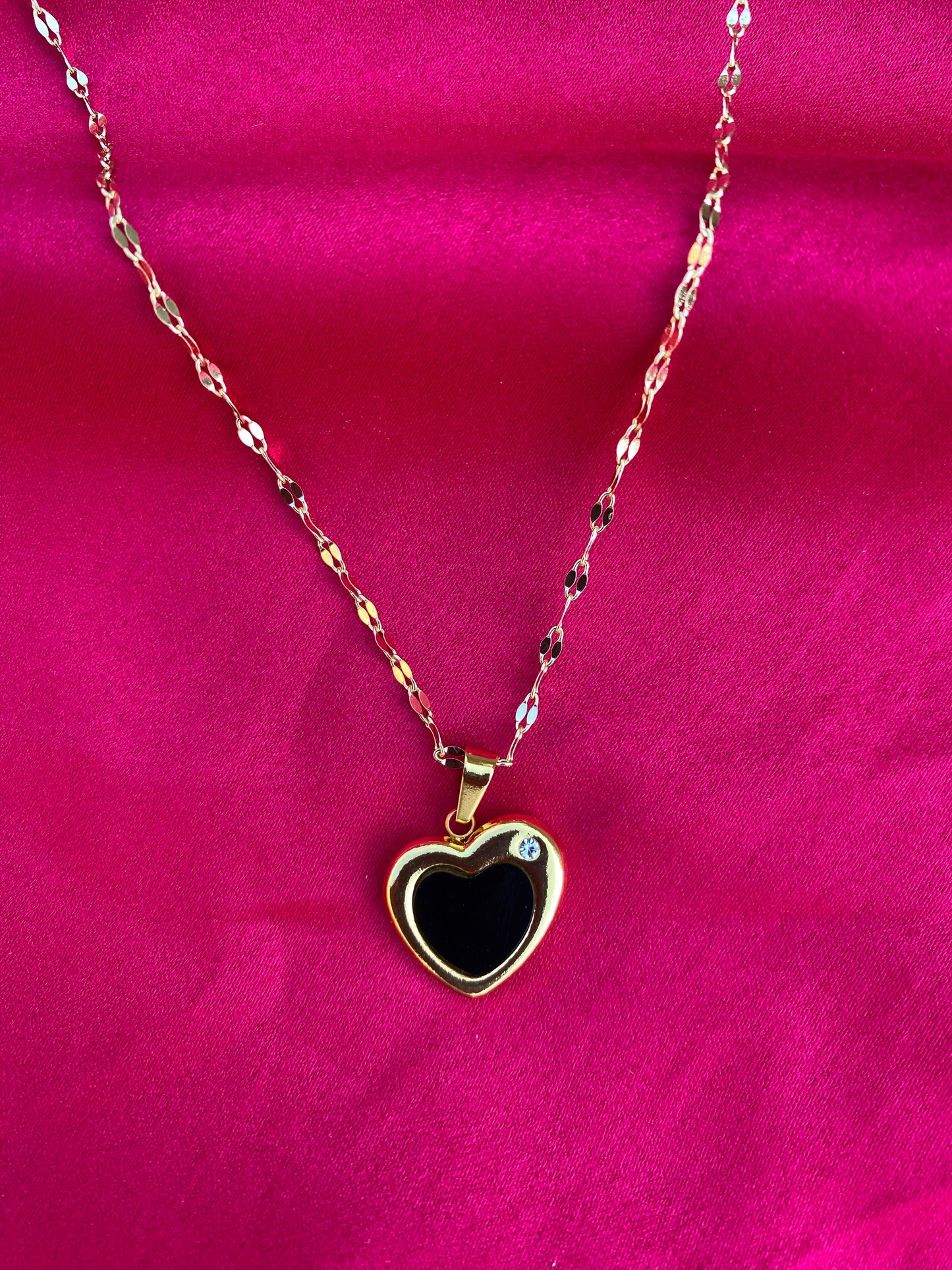 Necklace with a heart-shaped black pendant  (stainless steel)